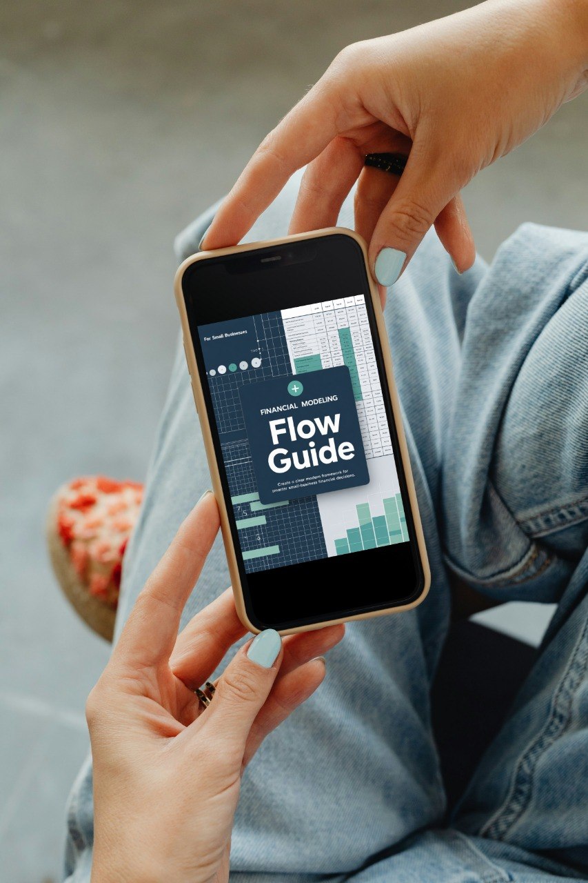 Person holding a smartphone displaying a 'Flow Guide' app with a blurred background