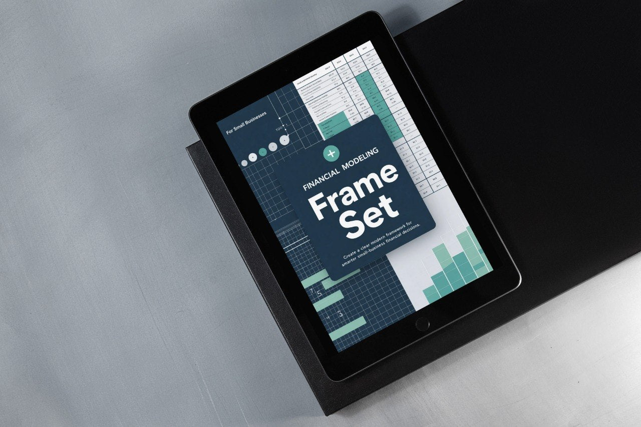 Tablet displaying a financial modeling frame set on a gray surface