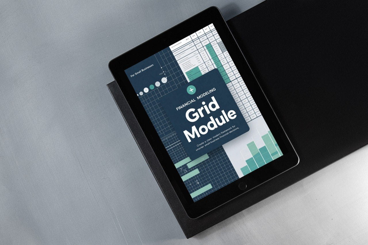 Tablet displaying a financial modeling grid module on a gray surface